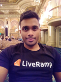 This Magoosh student is sitting in a fancy ballroom, with a smile in his eyes